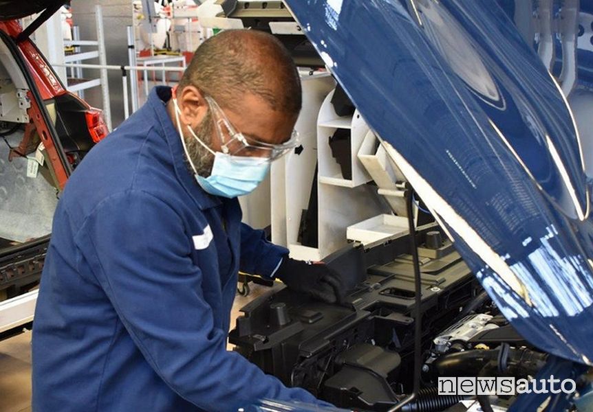 car production worker on the assembly line